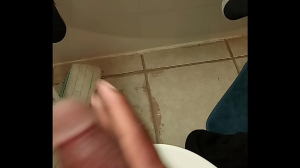 Love To stroke my small cock in the bathroom 9