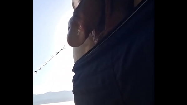 Taking a piss outdoor on the beach