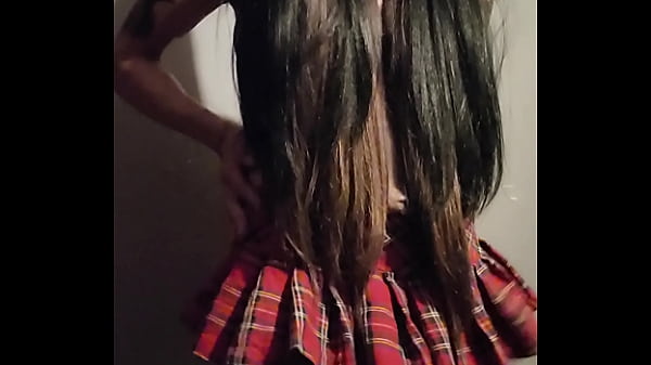 Crossdresser with long hair slow strip