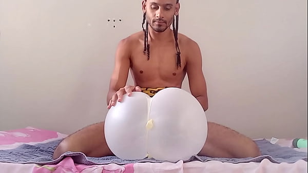 Fucking a glove balloon while wearing a rope corset. (DIY sextoy)