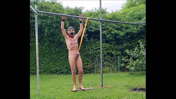 naked pathetic slave exposed in penis cage outdoor, during rain entertain the guests, BDSM CBT