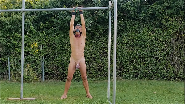 naked pathetic slave outdoor in penis cage, handcuffed, pee, clamps on testicles, BDSM CBT