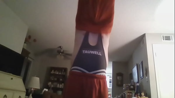 Young Man Playing with His Penis in a Westling Suit and Underwear