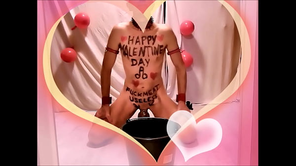naked pathetic slave in penis cage with VALENTINE DAY greetings as body writing after enema showing what master expect