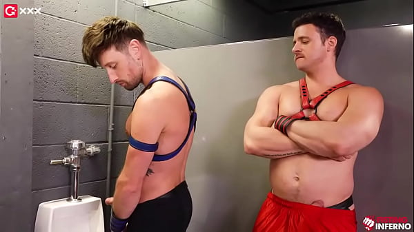 Alone in a rural bathroom Drew Dixon strokes his uncut cock at a urinal gay